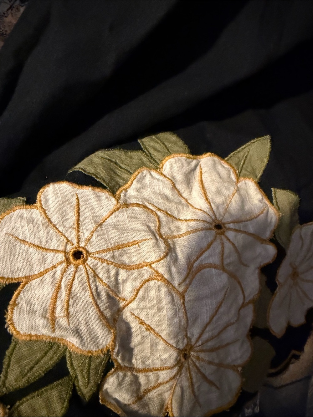 THE GREAT. Black Midi Dress with White Floral Trim and Green Leaves - Picture 3 of 4